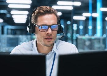 Portrait,Of,A,Young,Caucasian,Male,Call,Centre,Worker,Wearing